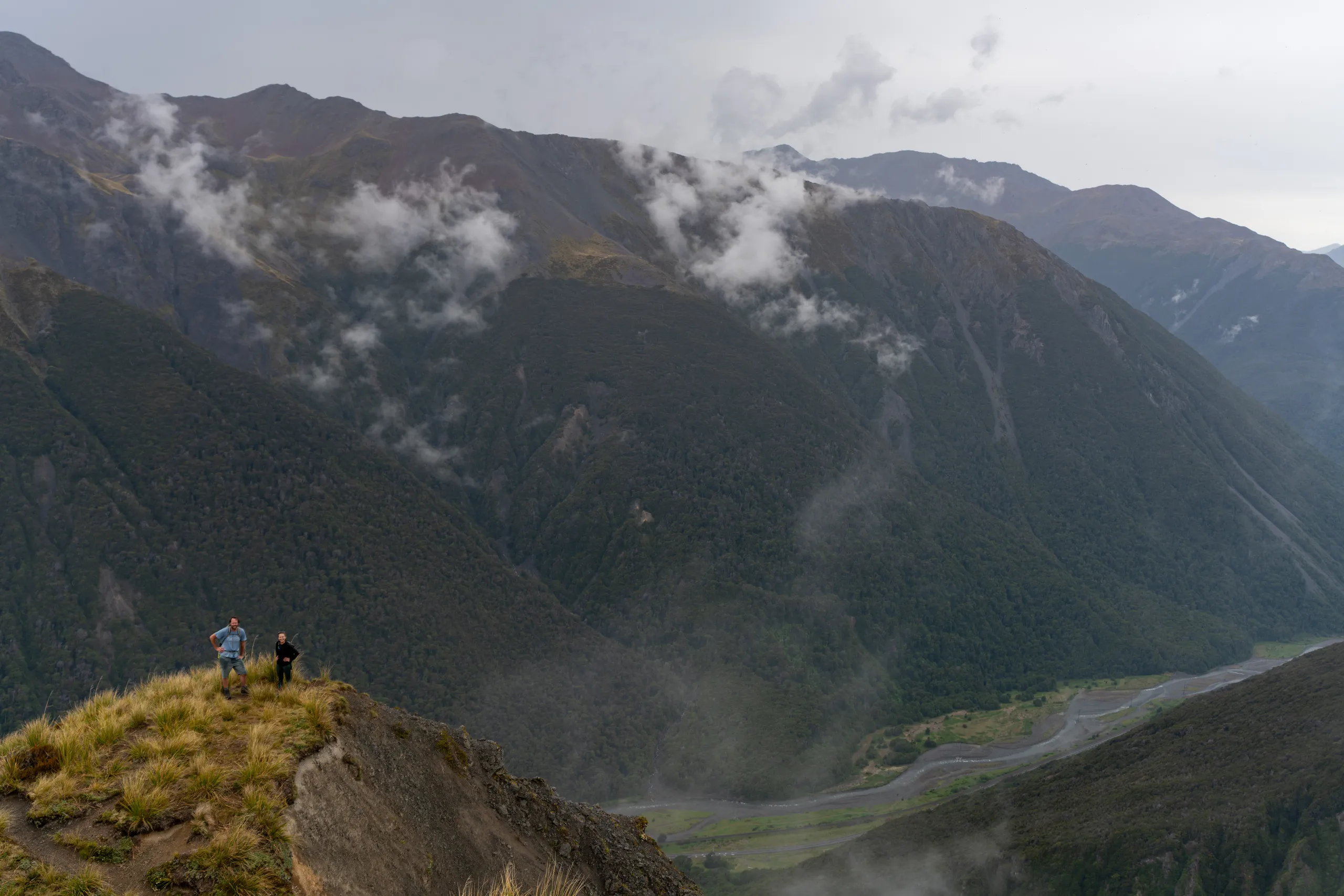 Catching a breath on the climb to the summit. Bealey River is visible at the base of the valley.