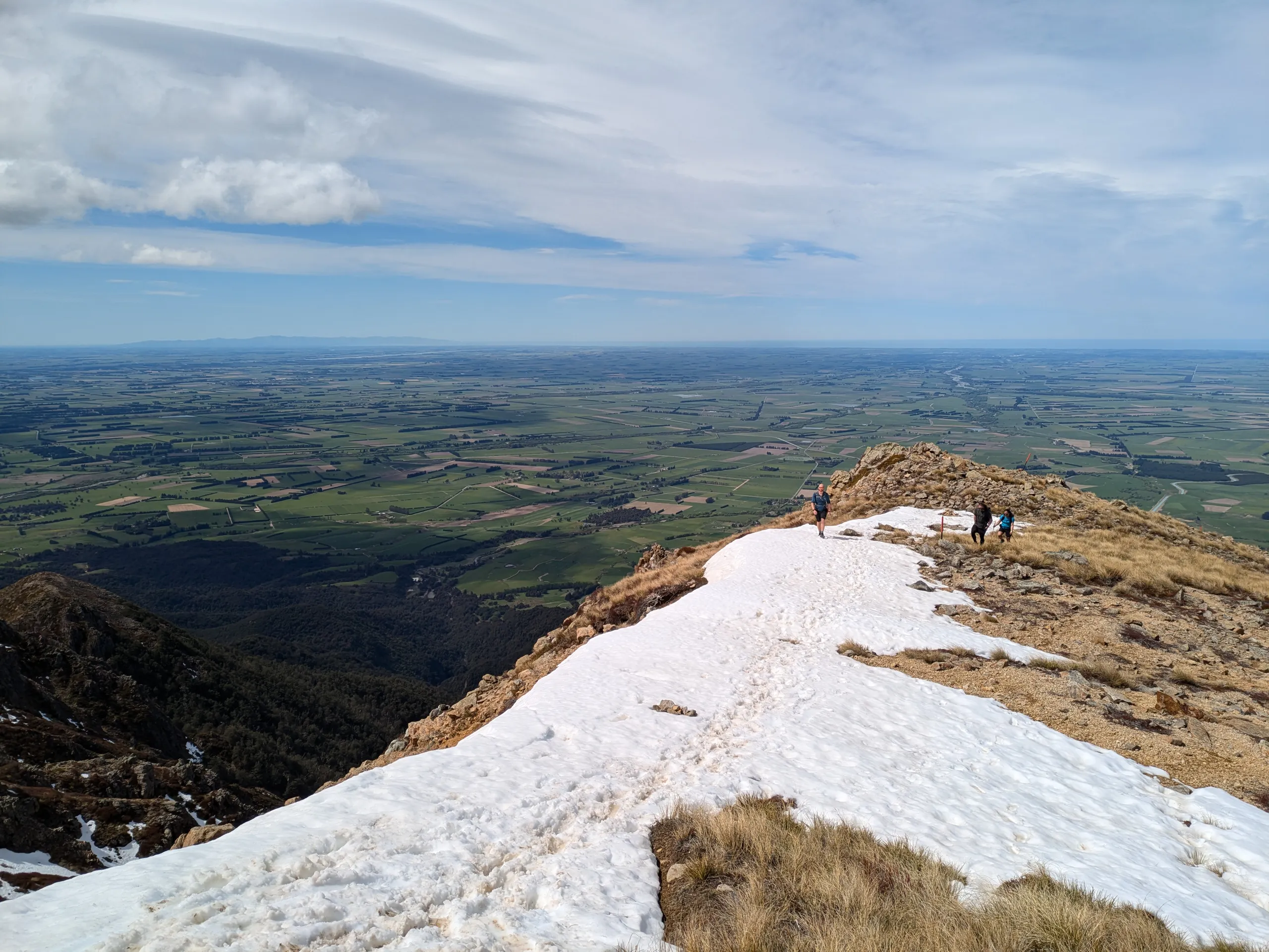 Icy ascent along the ridgeline to the summit