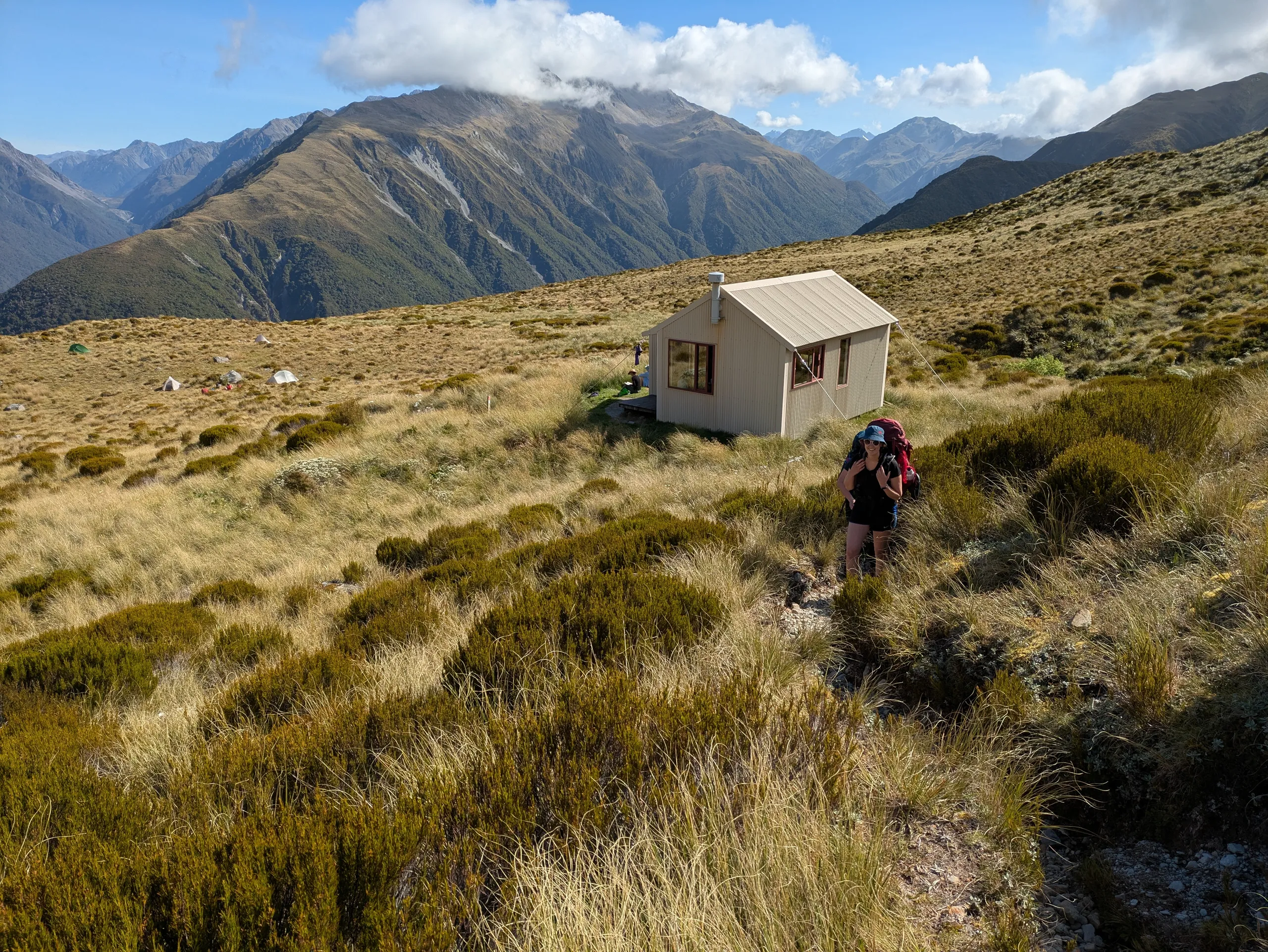 Carroll Hut, with Mt Barron rising into cloud opposite