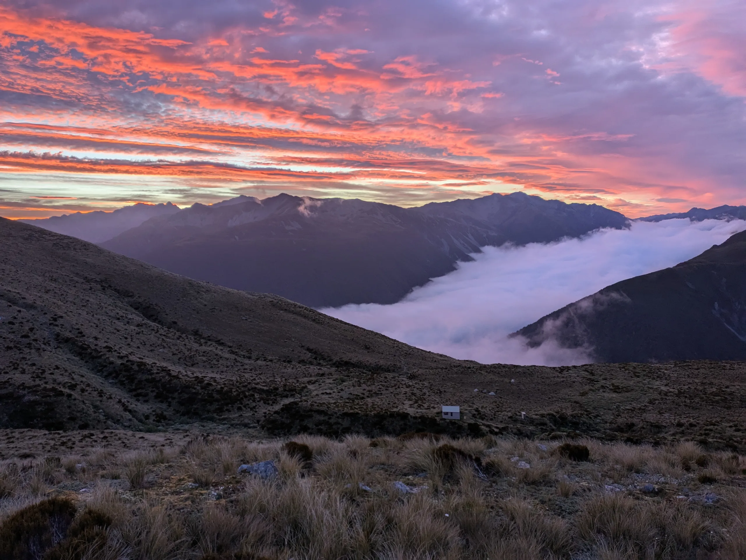 Dawn view facing Arthurs Pass, with the pass itself covered in low cloud